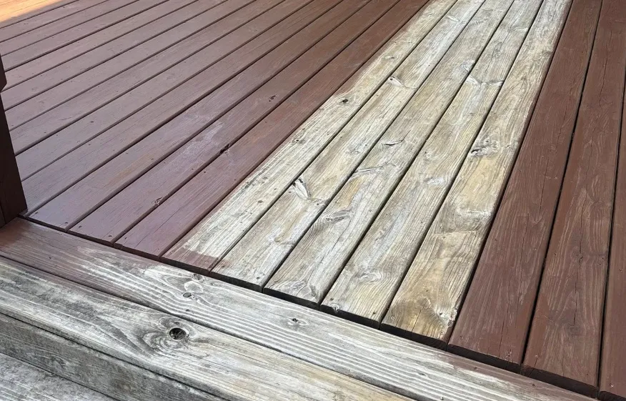 Deck before and after refinishing — faded gray boards transformed to rich warm brown